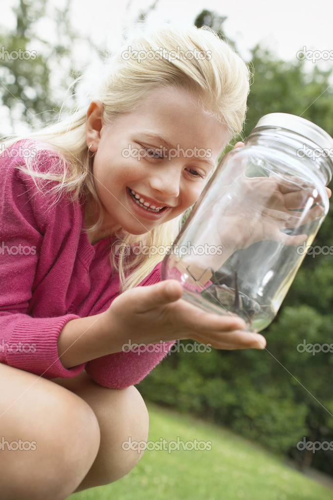 Girl Looking at Grasshopper