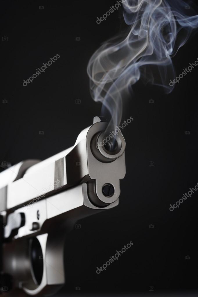 Smoking Handgun Stock Photo by ©londondeposit 33848235