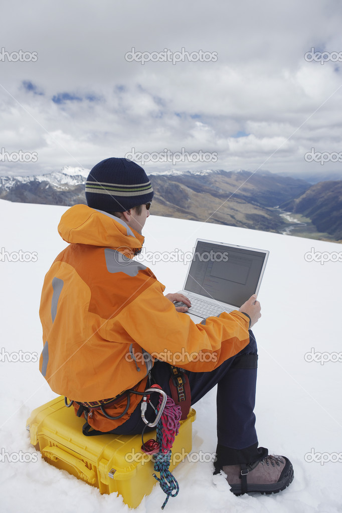 Hiker using laptop