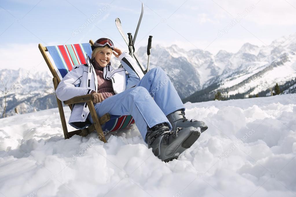 skier sitting on deckchair