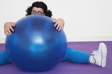 Woman Behind Exercise Ball clipart