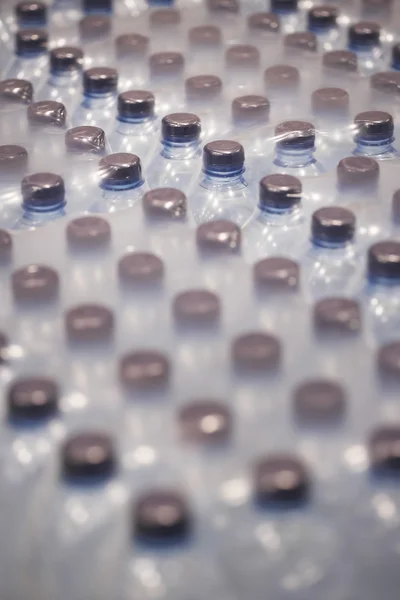 Bottles of Water Wrapped in Plastic — Stock Photo, Image