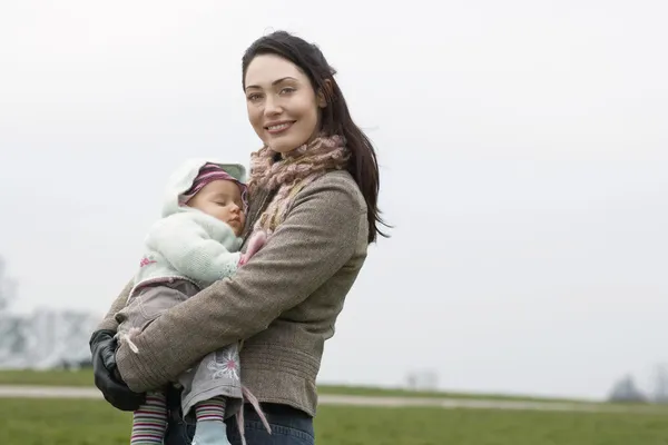 Mother with sleeping baby — Stock Photo, Image