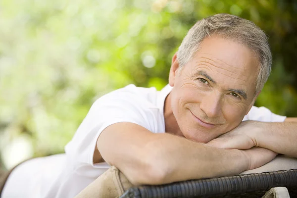 Man relaxing on chair — Stock Photo, Image