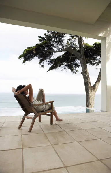 Woman Relaxing on Porch — Stock Photo, Image