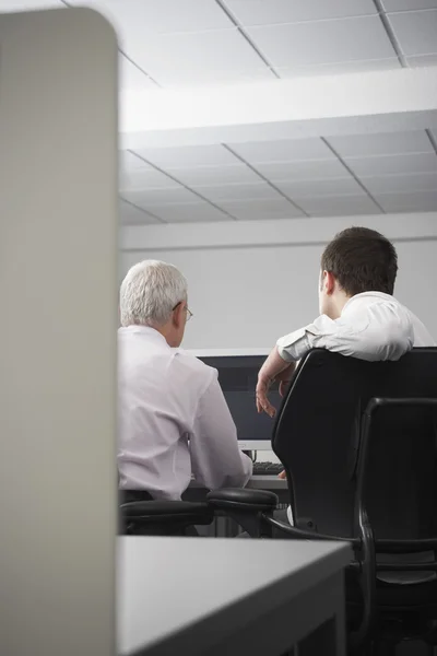 Businessmen using computer — Stock Photo, Image