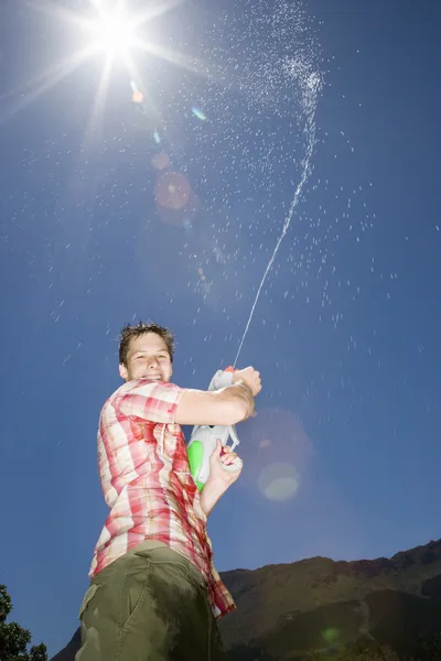 Boy with Water Cannon — Stock Photo, Image