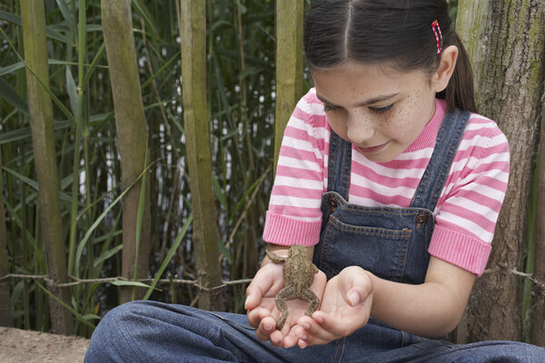 Girl Holding Frog