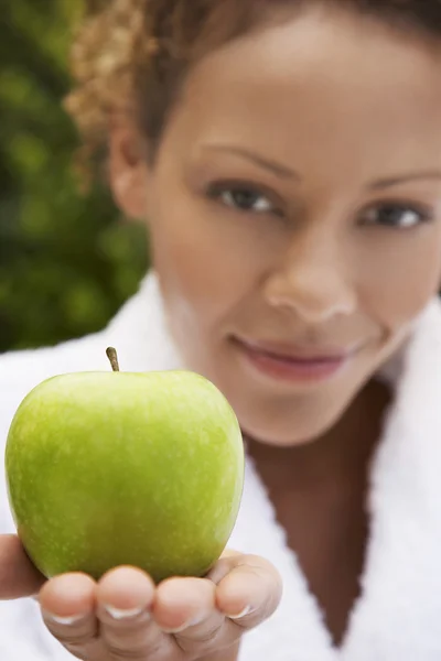 Woman  holding apple — Stock Photo, Image
