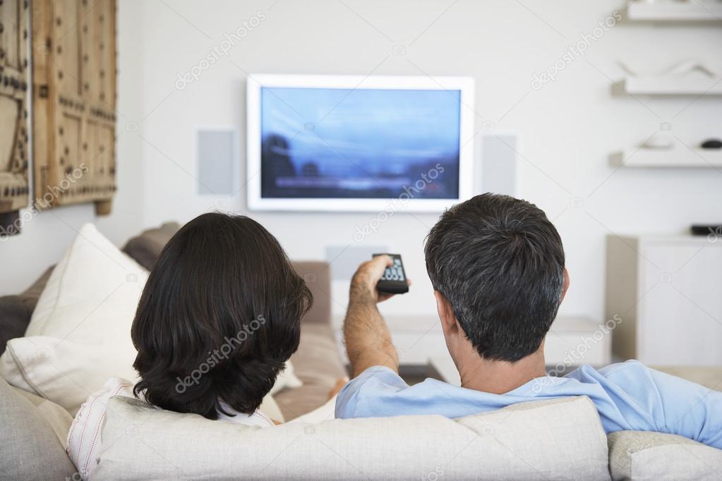 Couple using remote control