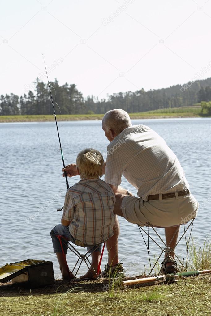 Grandfather and Grandson Fishing