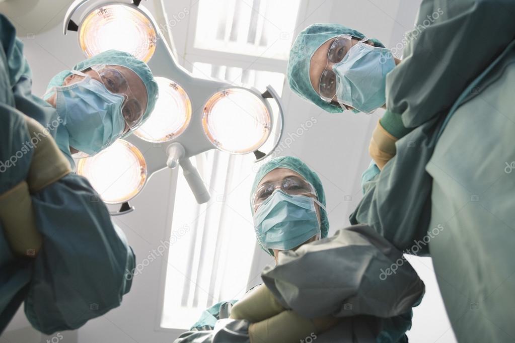 Surgeons in operating theatre
