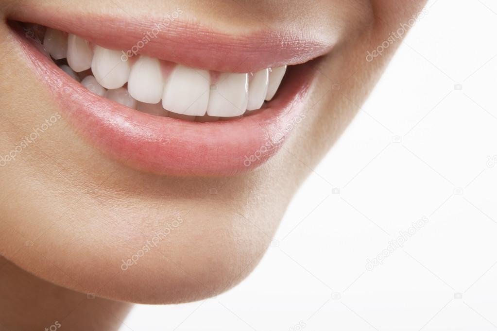 Woman's open mouth smiling