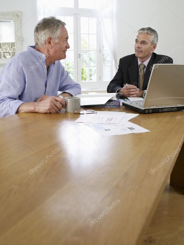 Man with financial advisor
