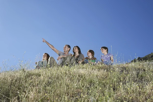 Family Resting in Meadow — Stock Photo, Image