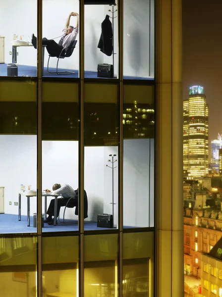 Tired business men in offices — Stock Photo, Image