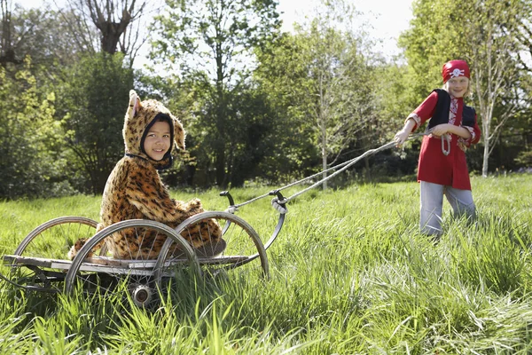 Boys in pirate and jaguar  costumes — Stock Photo, Image