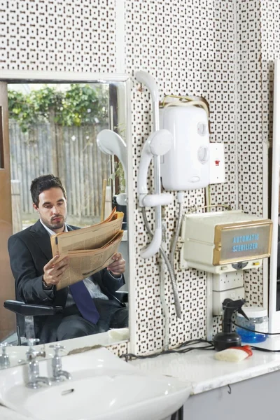 Business man reading newspaper — Stock Photo, Image