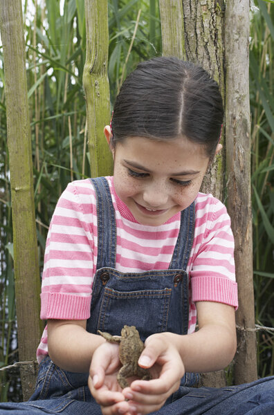 Girl Holding Frog