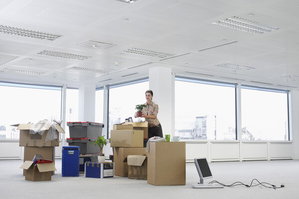 Woman with Cardboard Boxes