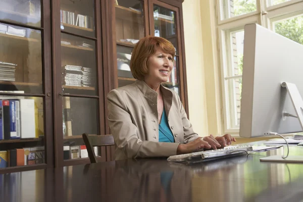 Professor Using Computer — Stock Photo, Image