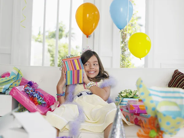 Little girl with birthday presents — Stock Photo, Image