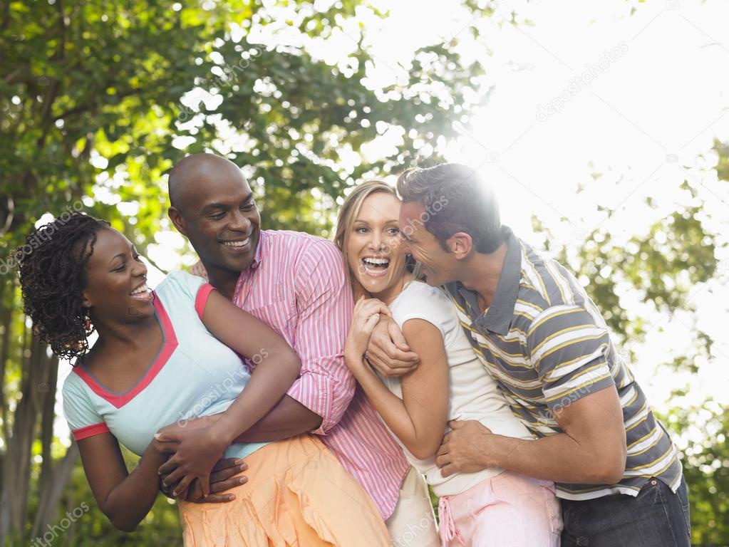 Two couples laughing