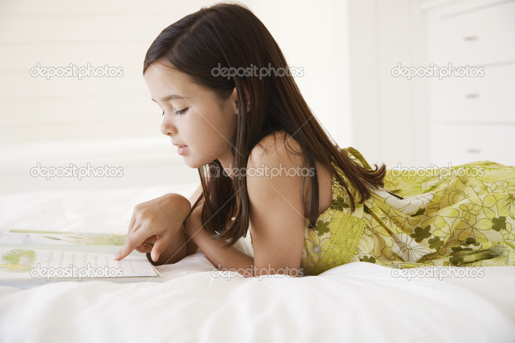 Girl reading story book