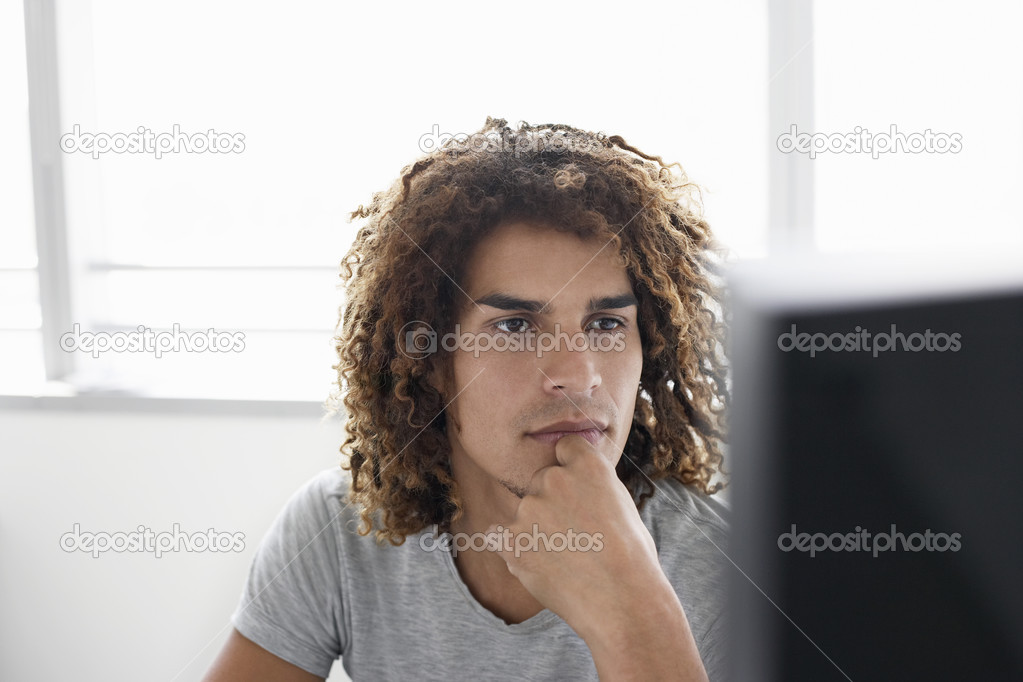 Young  Man using computer