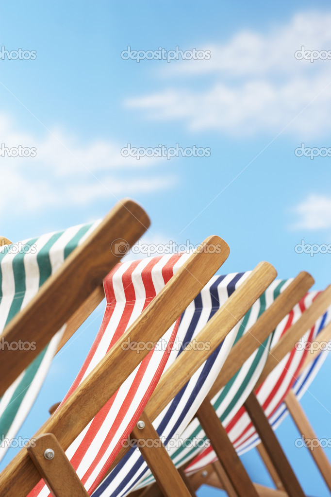 folding deck chairs on beach