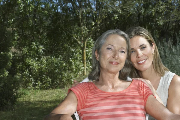 Mother with daughter smiling — Stock Photo, Image