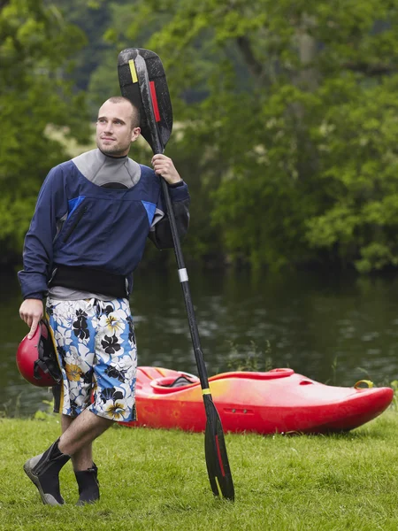 Male adult with canoe — Stock Photo, Image
