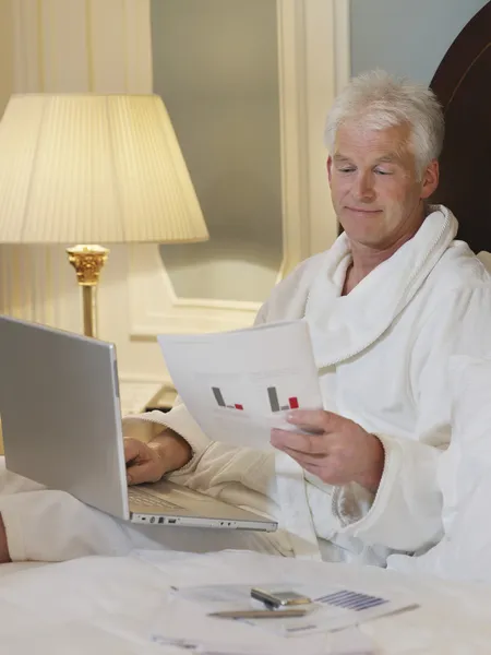 Businessman Using Laptop in Bed — Stock Photo, Image