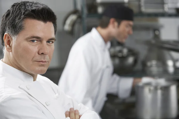 Male chef with colleague — Stock Photo, Image