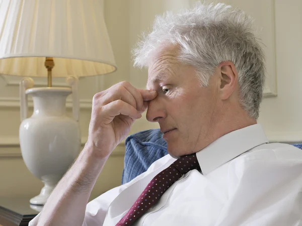 Businessman Touching His Nose — Stock Photo, Image