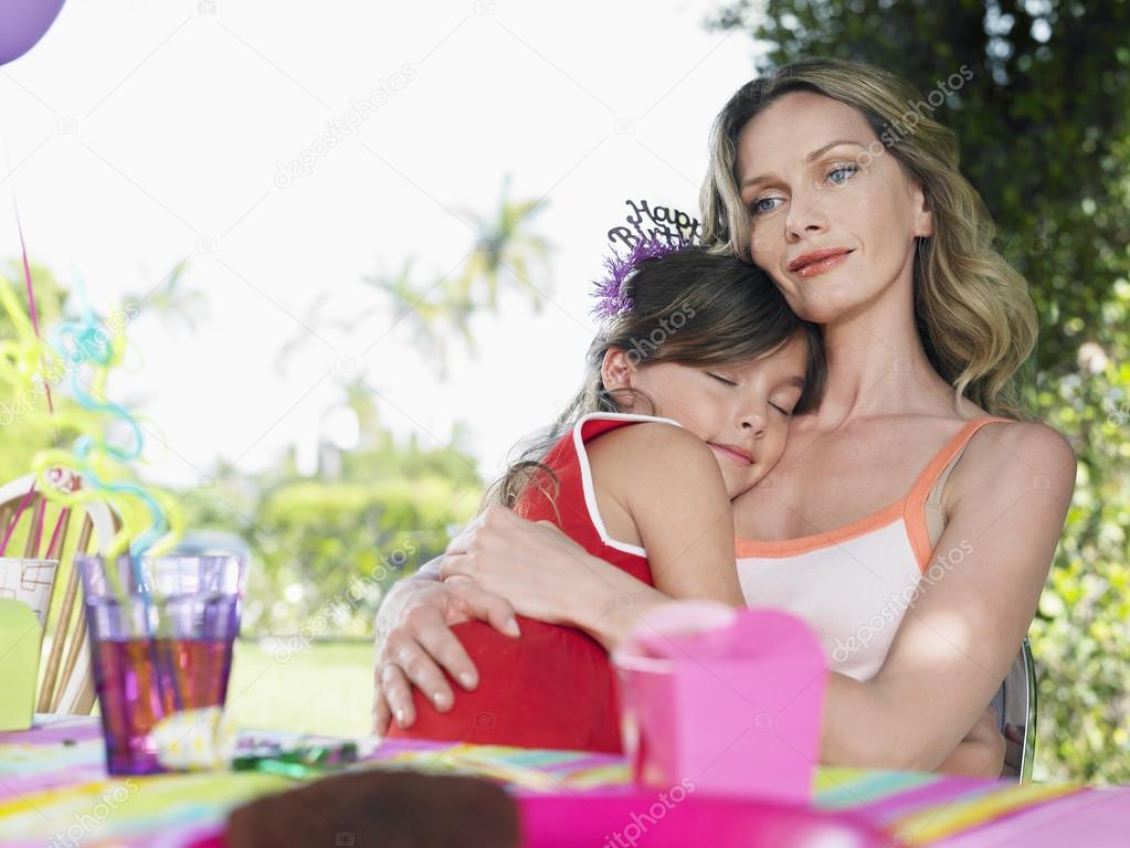 Mother and daughter at  table