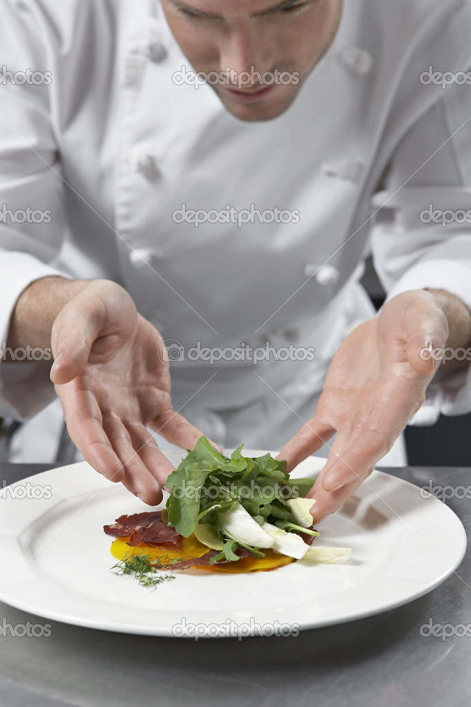 Chef preparing salad