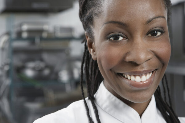 Female chef smiling