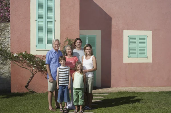 Family with two children standing — Stock Photo, Image