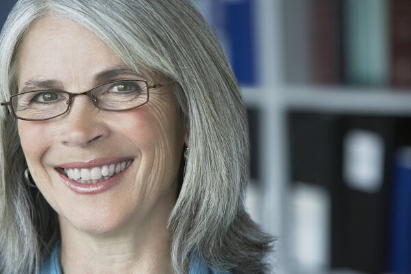 Middle aged businesswoman smiling