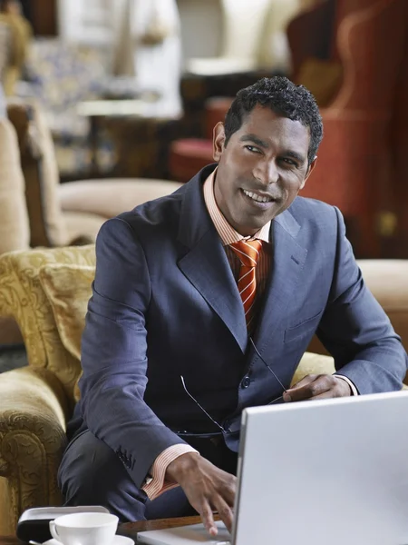 Businessman working on laptop — Stock Photo, Image