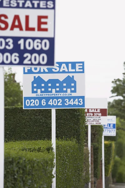 Real estate for sale signs — Stock Photo, Image