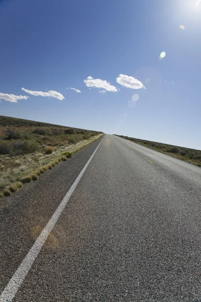 Road through desert — Stock Photo, Image