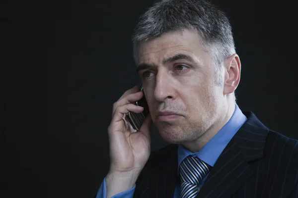 Businessman using cellphone — Stock Photo, Image