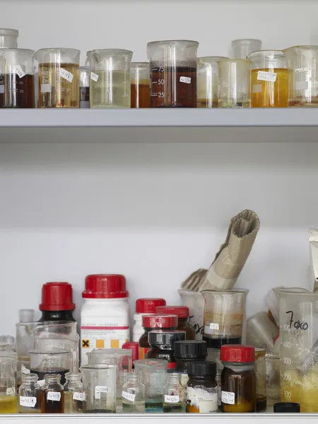 Bottles and lab flasks — Stock Photo, Image