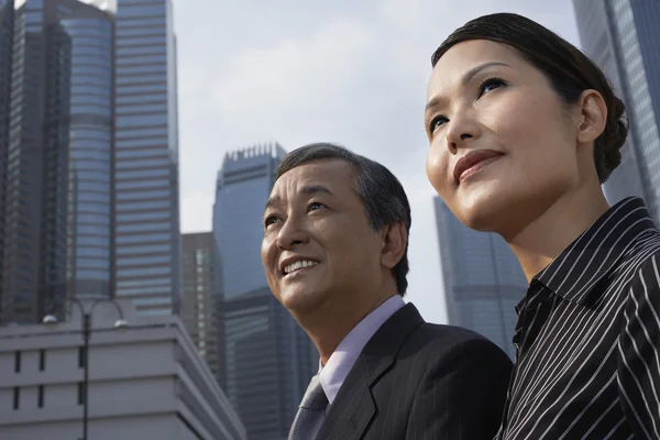 Businesspeople looking away — Stock Photo, Image