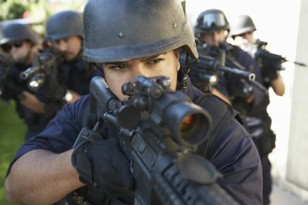 Swat officers aiming guns — Stock Photo, Image