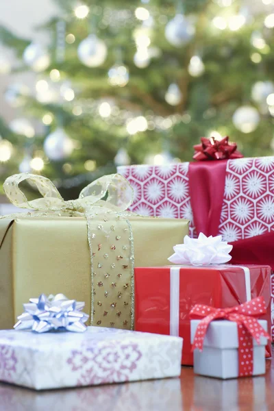 Christmas presents on floor — Stock Photo, Image