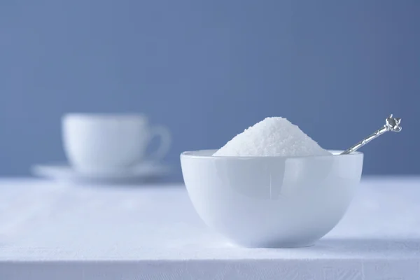 Bowl of sugar on table — Stock Photo, Image