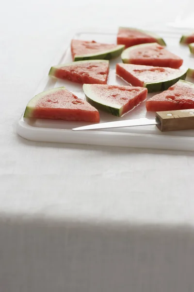 Watermelon slices on board — Stock Photo, Image